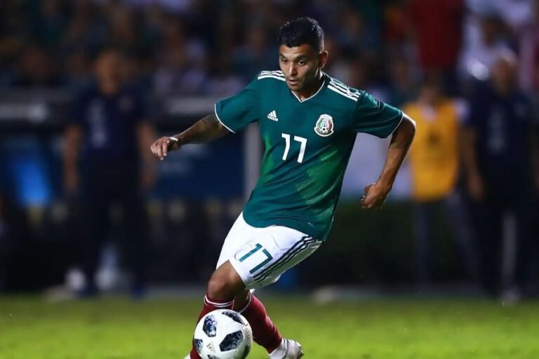 A Mexico soccer team player playing a warm up match for the world cup