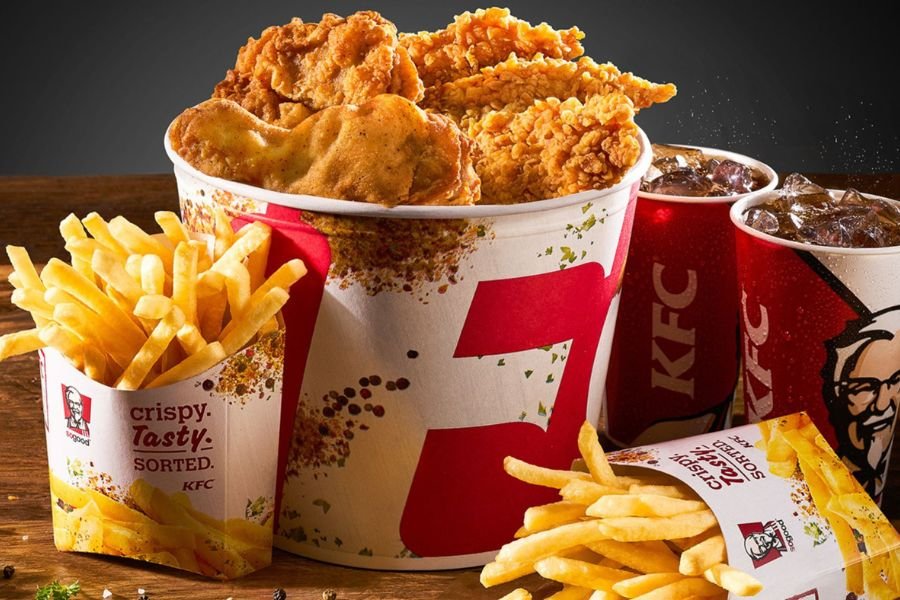 A bucket of KFC greasy fast food meal