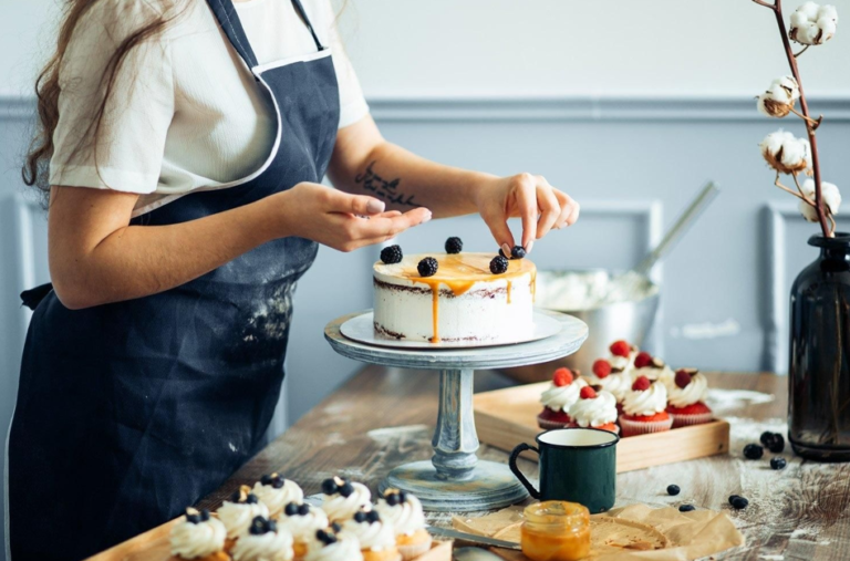 Lady arranging desserts for a birthday party